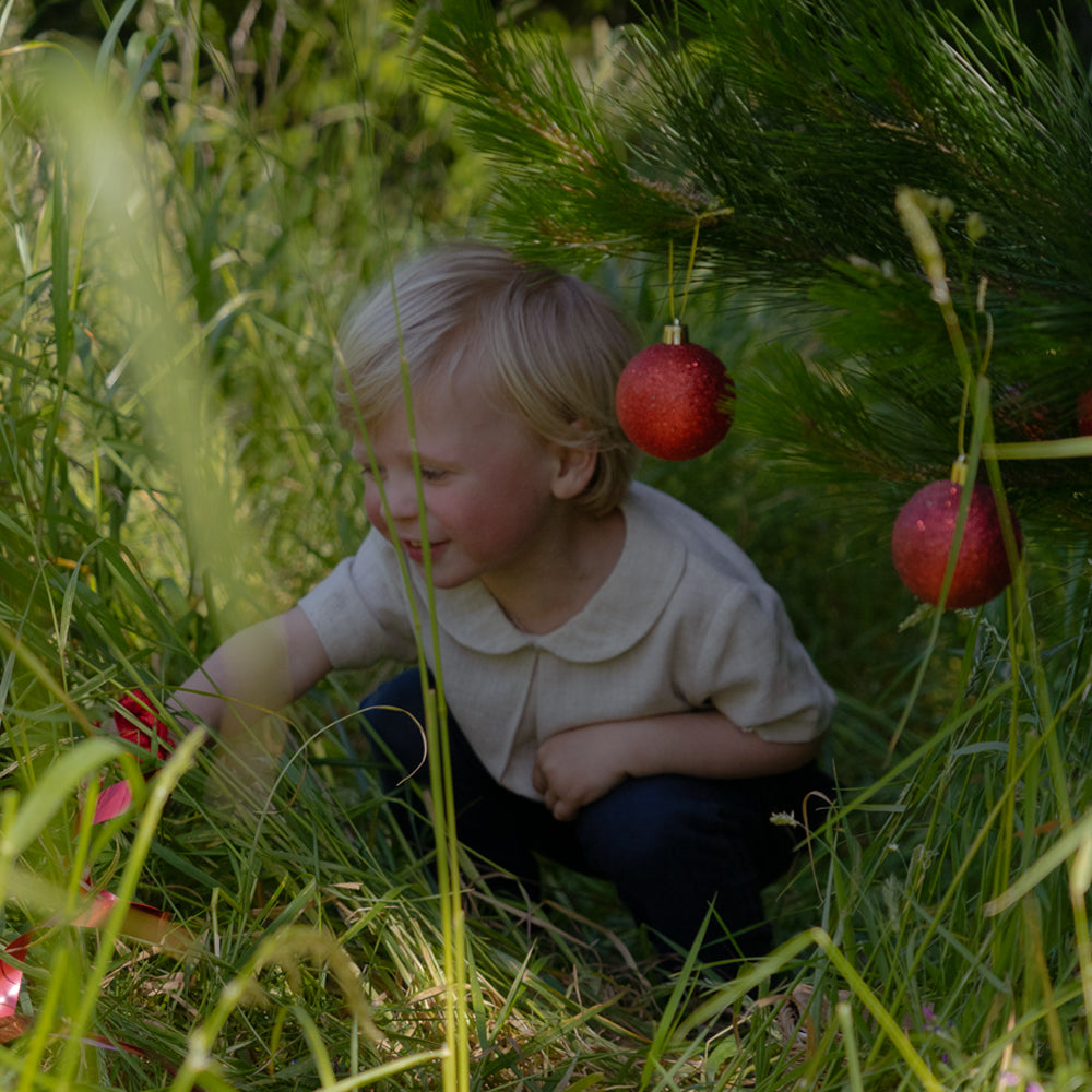 Young child wearing Twee & Co's Darcy Linen Shirt