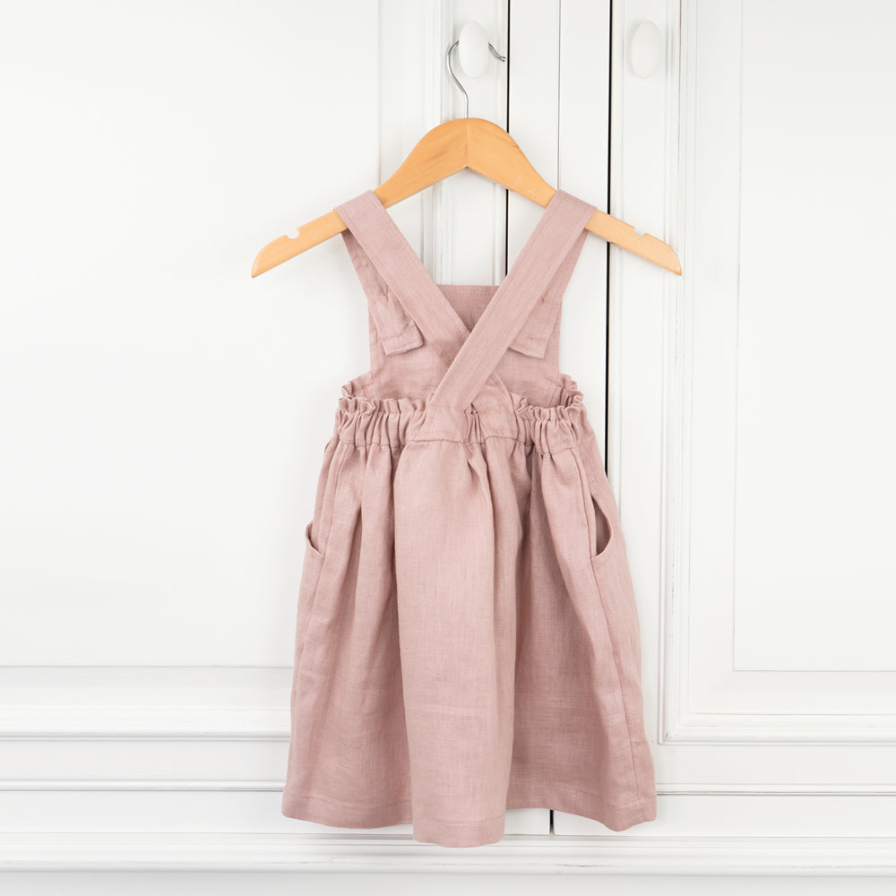 Made by Twee & Co Organic Boutique, the Emily Pinny is a girl's pink linen dress, made in New Zealand NZ 