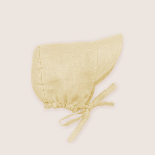 Twee and Co's Organic Linen Peaked Bonnet — Lemon colour