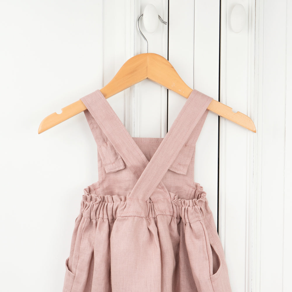 Made by Twee & Co Organic Boutique, the Emily Pinny is a girl's pink linen dress, made in New Zealand NZ 