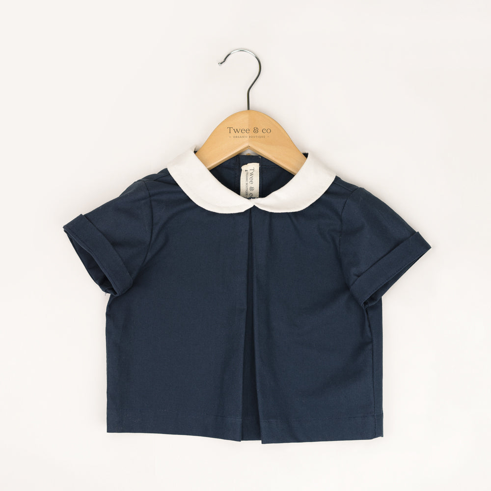 Little Noah, organic cotton navy shirt with white Peter Pan collar — by Twee & Co 