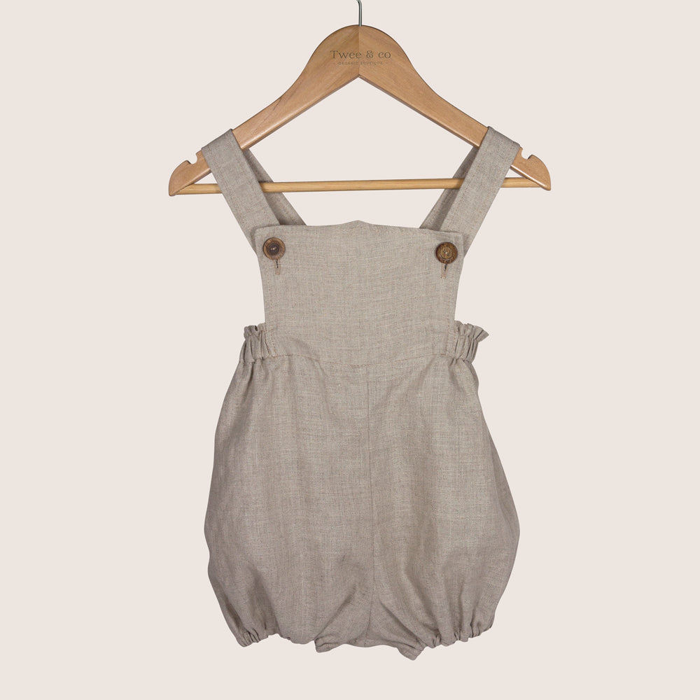 Winnie Romper by Twee & co Organic Boutique is made from organic linen and features non-toxic wooden buttons. Made in New Zealand NZ 
